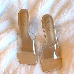 Tan, clear straps, square toes, 4 inch heel.